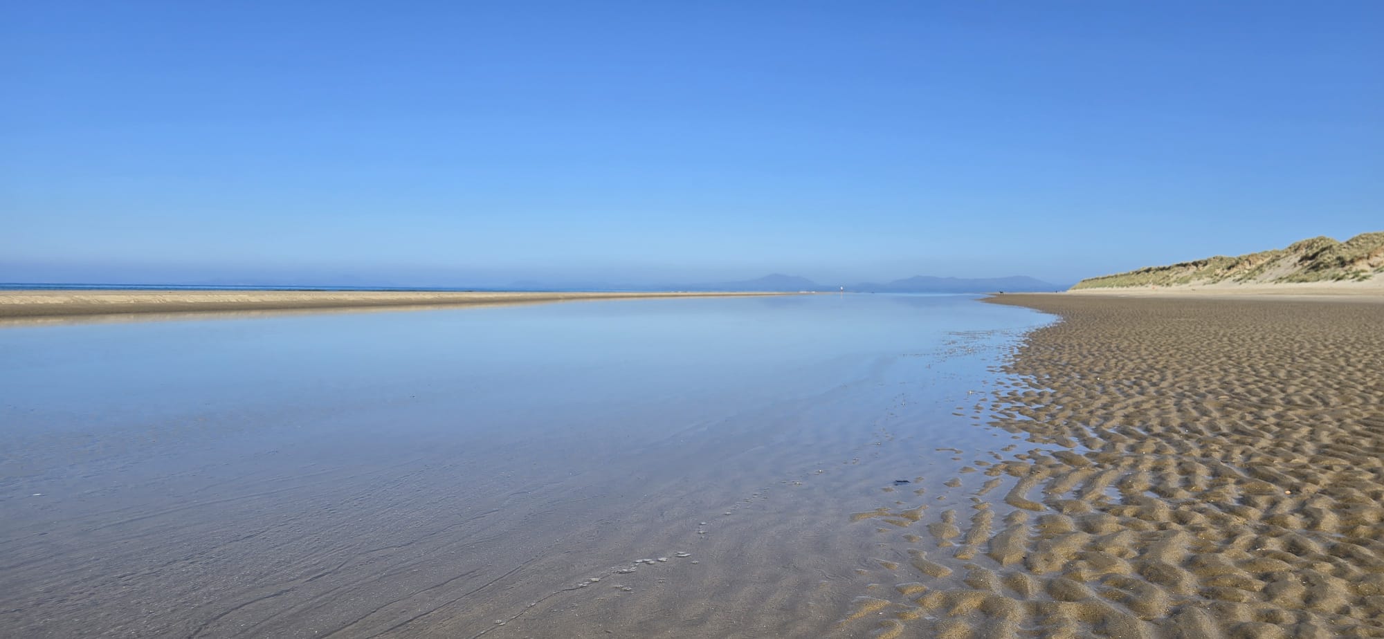 Rippled sand at low tide